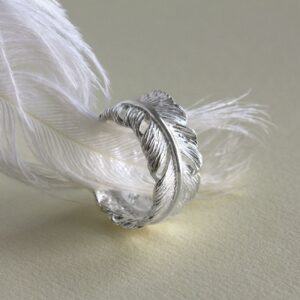 Silver wrap around feather ring