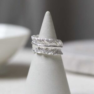 Sterling Silver Feather Ring on a ring holder