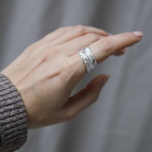 model wearing Sterling Silver Feather Ring