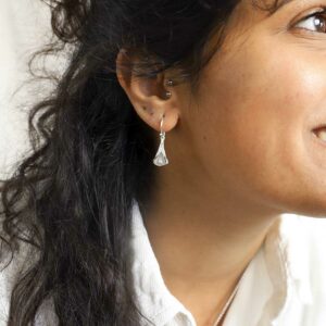 Model Wearing Calla Lily Dangly Earrings