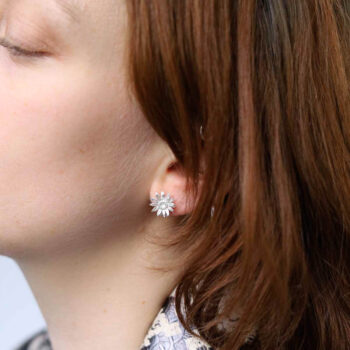 Sterling Silver Daisy Stud Earrings on model
