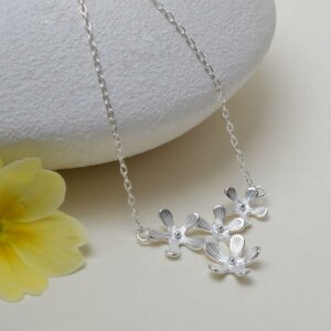 Silver four blossoming flowers pendant necklace