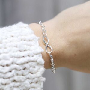 Model wearing Sterling Silver Infinity Bracelet