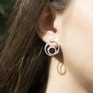 Polished silver twirling loop studs