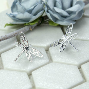 Polished silver dragonfly in flight studs