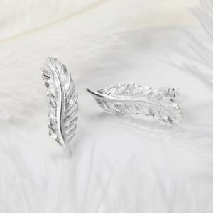 Polished silver curved feather studs