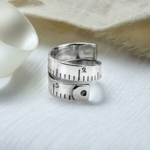 Silver adjustable wrap around measuring tape ring