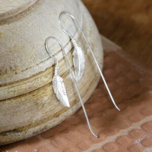 Small silver single feather hanging bar earrings