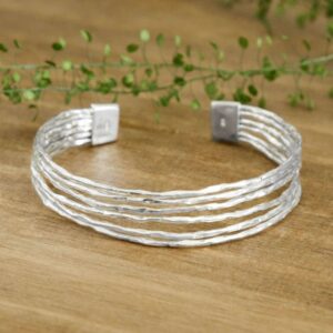 Silver rough textured bangle with clasp