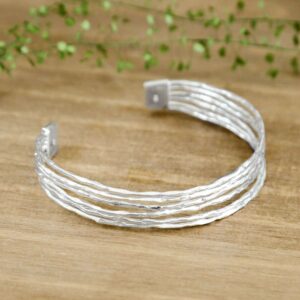 Silver rough textured bangle with clasp