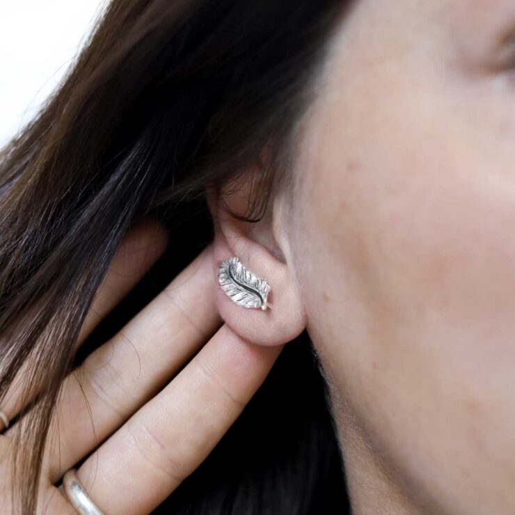 Sterling Silver Feather Ear Climbers on model