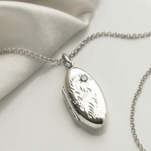 Sterling Silver Oval Locket white background with silk detail