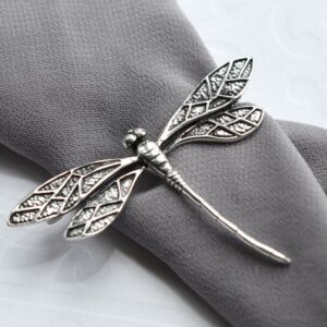 Silver dragonfly in flight brooch