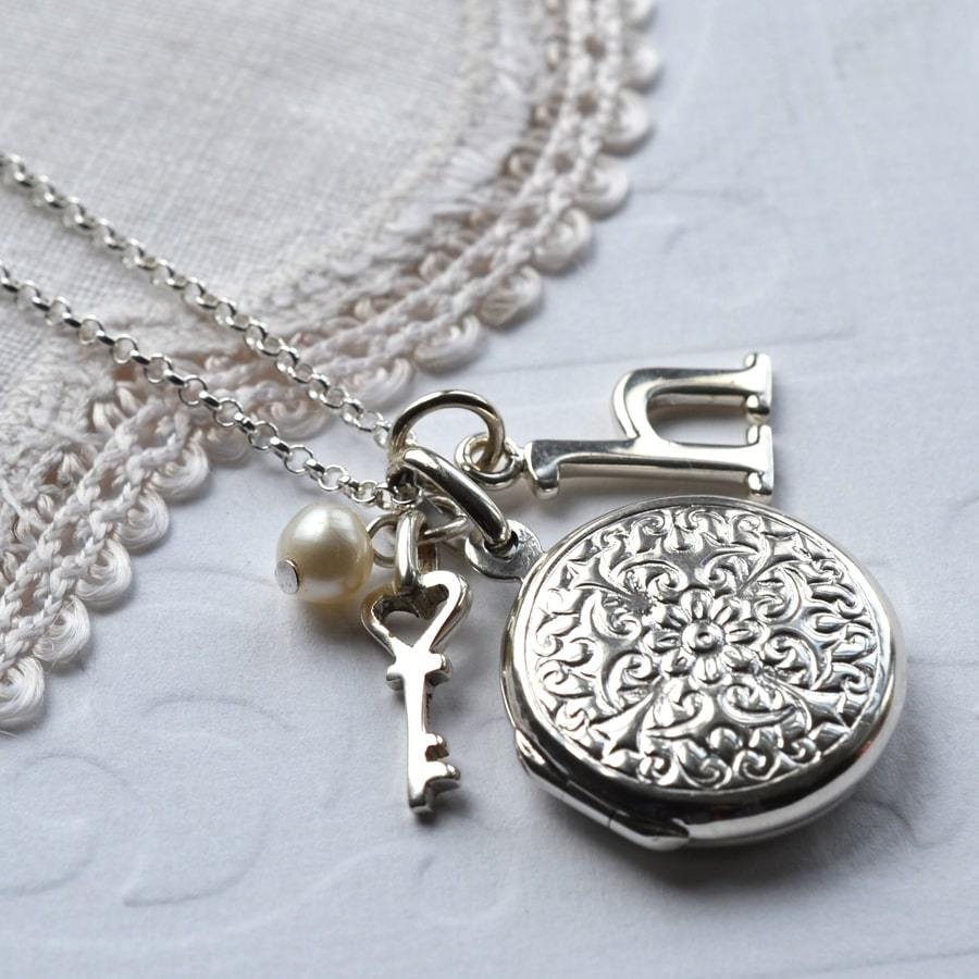 Silver decorative floral round locket