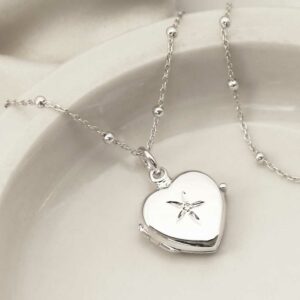 Sterling Silver Diamond Kissed Locket with satellite chain on white background with silk detail