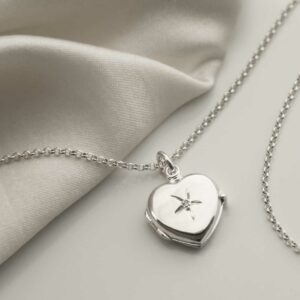 Sterling Silver Diamond Kissed Locket on white background with silk detail