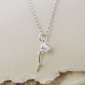 Silver tiny stemmed rose necklace