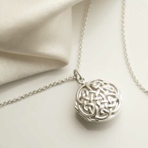 Sterling Silver Round Celtic Locket on silk background