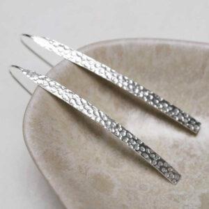 Sterling Silver Urban Armour Drop Earrings on jewellery dish