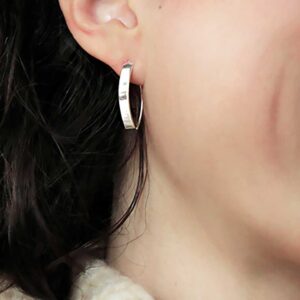 model wearing Sterling Silver Urban Shield Drop Earrings