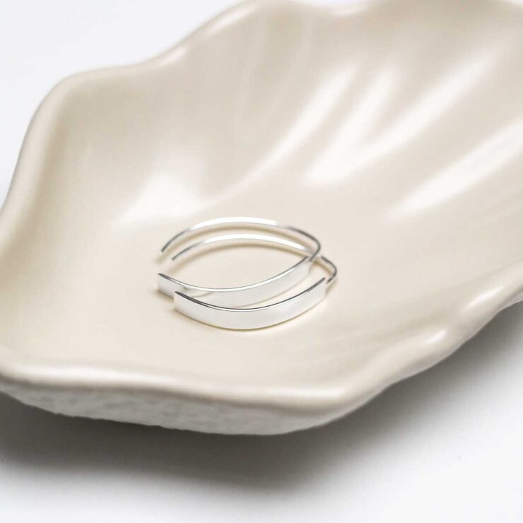 Sterling Silver Urban Shield Drop Earrings in jewellery dish