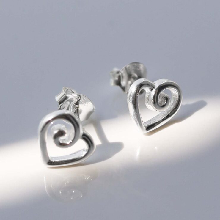 Sterling Silver Delicate Spiral Heart Earrings in sun