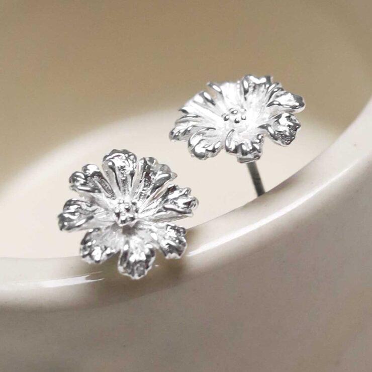 MD285E_Sterling Silver Cosmos Flower Studs_7 Sterling Silver Cosmos Flower Studs on jewellery dish