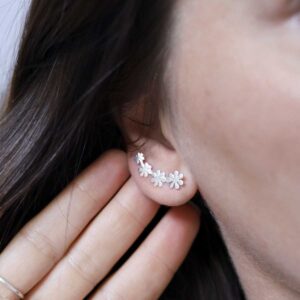 Sterling Silver Curved Flower Ear Climbers on model