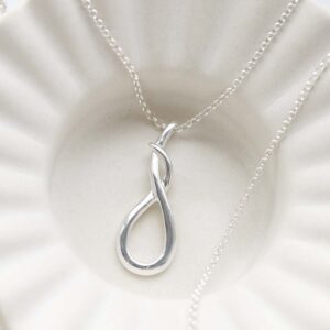 Sterling Silver Designer Loop Necklace in trinket dish