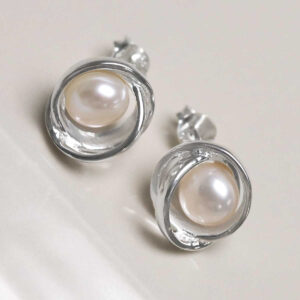 Sterling Silver Designer Round Pearl Studs on jewellery dish