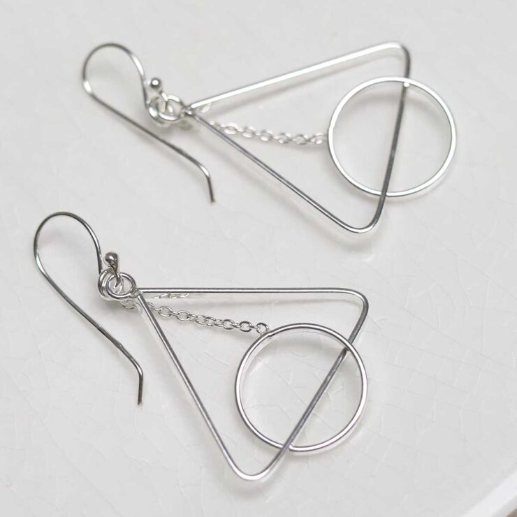 MD344_Sterling Silver Triangle And Circle Dangly Earrings_4 Sterling Silver Triangle And Circle Dangly Earrings on white