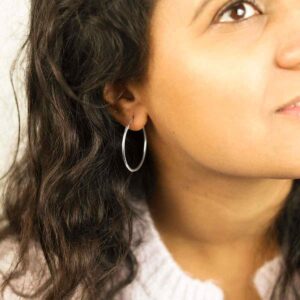 Brunette Model Wearing Sterling Silver 30mm Hoop Earrings