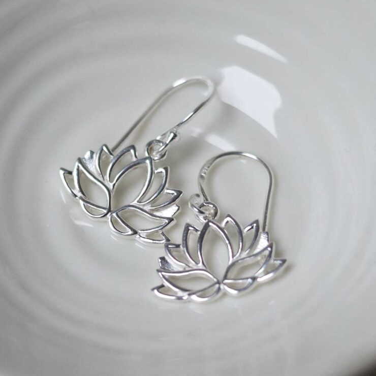 Sterling Silver Dangly Lotus Flower Earrings in jewellery dish