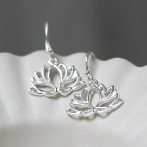 Sterling Silver Dangly Lotus Flower Earrings on jewellery tray