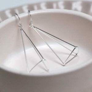Sterling Silver Dangly Trigonal Pyramid Earrings on jewellery dish