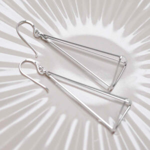 Sterling Silver Dangly Trigonal Pyramid Earrings on jewellery dish