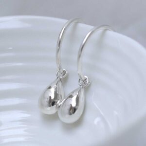 Sterling Silver Teardrop Stud Hoop Earrings on jewellery dish