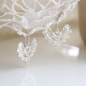 Sterling Silver Dangly Lace Heart Earrings on lace