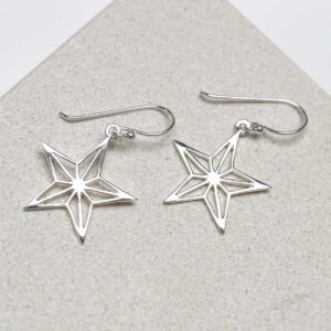 Sterling Silver Dangly Geometric Star Earrings on stone