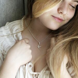 Sterling Silver Swallow Necklace on Model with Blonde Hair