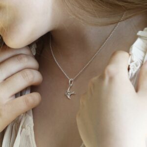 Sterling Silver Swallow Necklace on Model with Blonde Hair