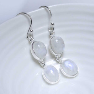 Sterling Silver Double Moonstone Dangly Oval Earrings on white dish