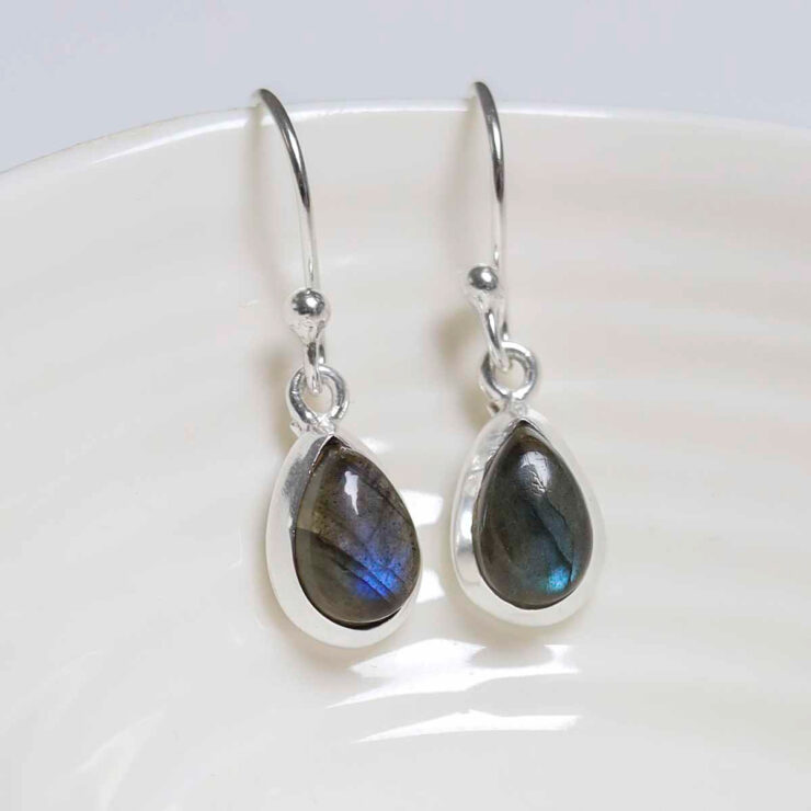 MJ751A_Sterling Silver Dangly Labradorite Teardrop Earrings_2 Sterling Silver Dangly Labradorite Teardrop Earrings on white dish