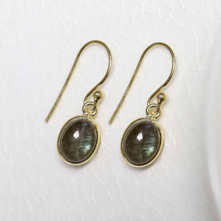 Sterling Silver Gold Plated Dangly Labradorite Oval Earrings on white