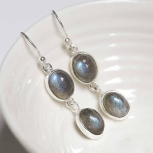 Sterling Silver Double Labradorite Dangly Oval Earrings on white dish