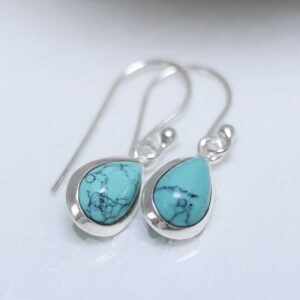 Sterling Silver Dangly Turquoise Teardrop Earring on white