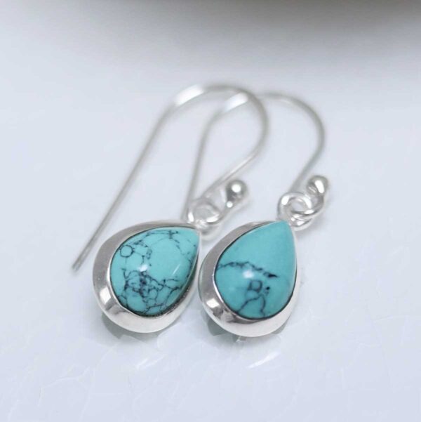 Sterling Silver Dangly Turquoise Teardrop Earring on white