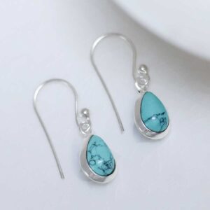 Sterling Silver Dangly Turquoise Teardrop Earring on white