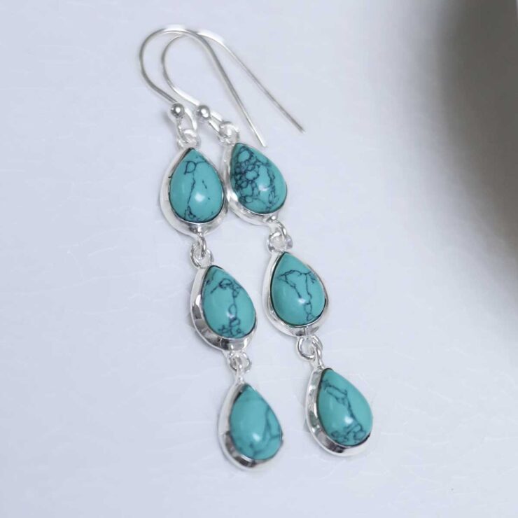 Sterling Silver Triple Turquoise Dangly Teardrops on white