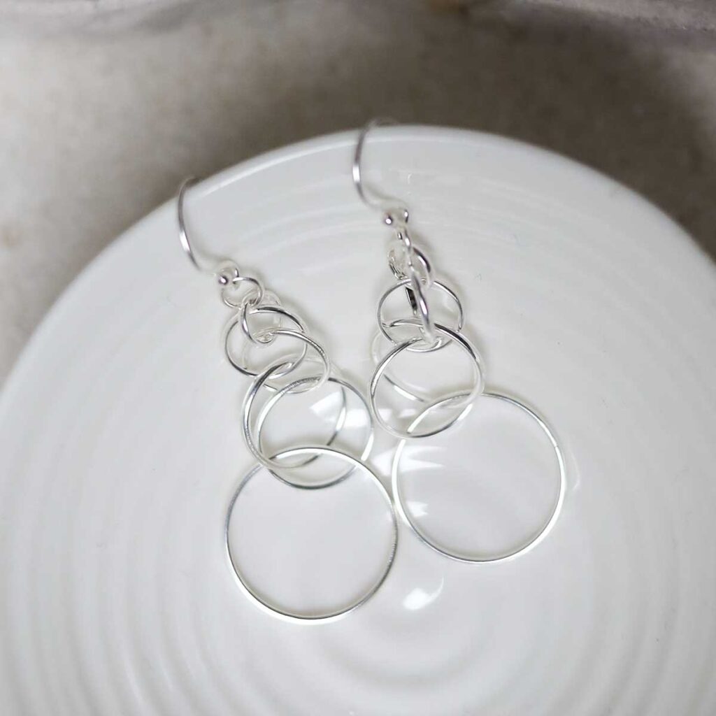 Sterling Silver Wire Circle Drop Earrings in jewellery dish
